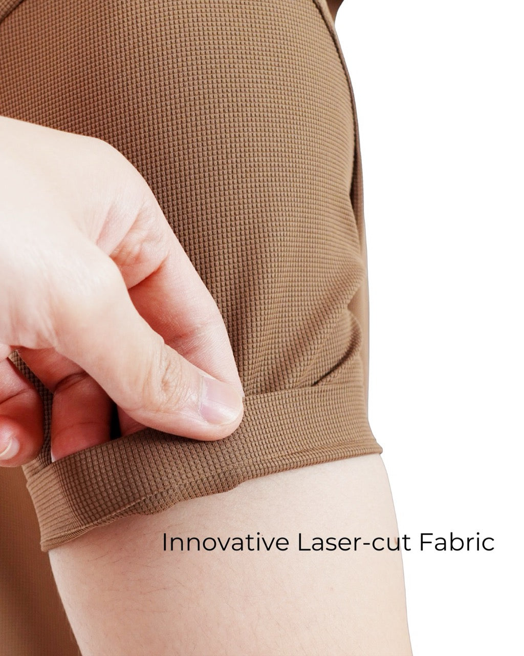 Close-up of Modern Luxe Polo's textured laser-cut fabric and sleeve.