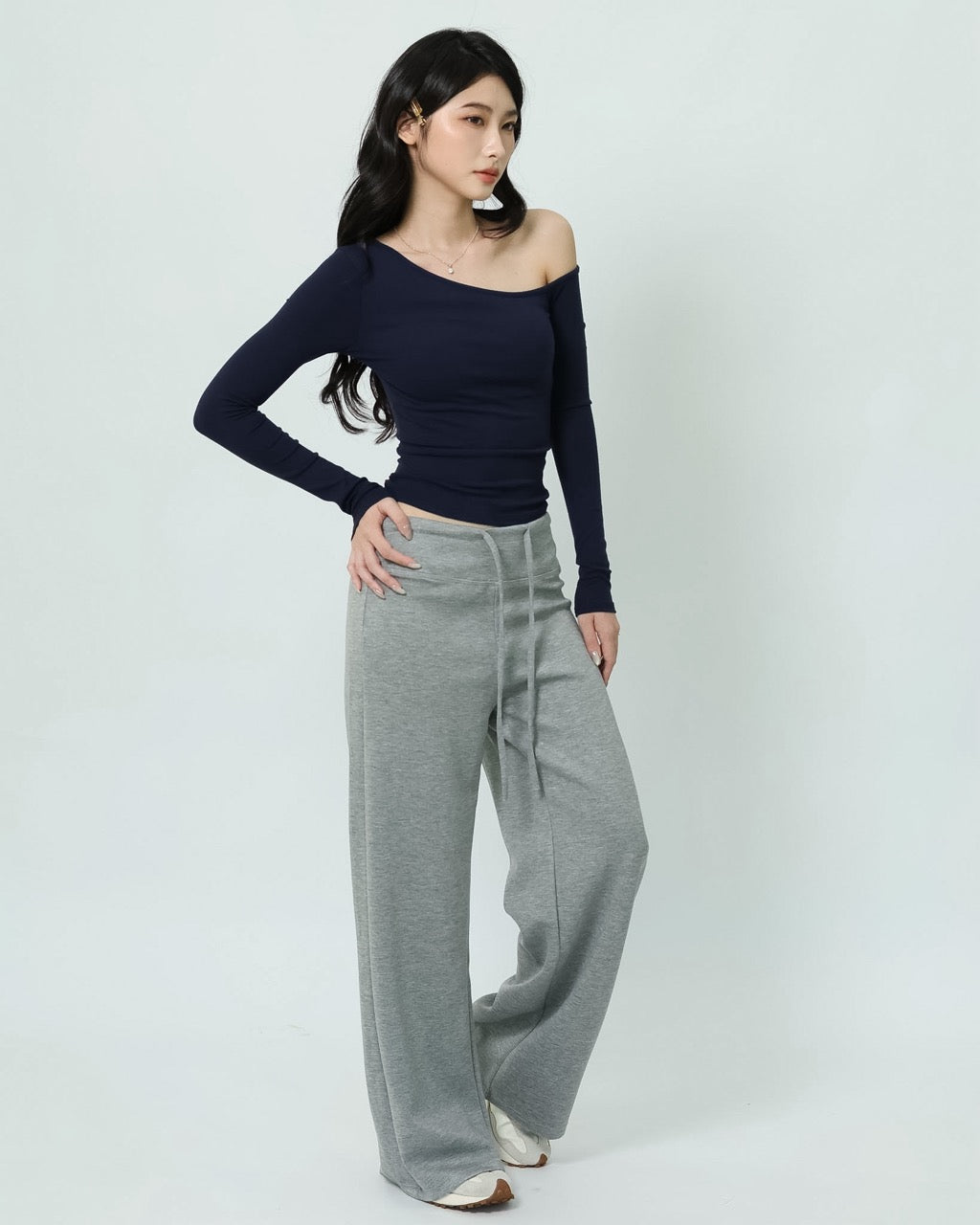 Grey Meltsoft pants worn with a fitted top, showing the full-length wide-leg fit