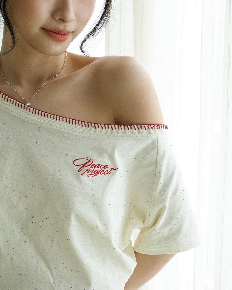 Peace Project Off-shoulder — garment detail