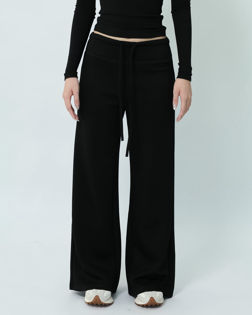 Black Meltsoft Wide-leg Pants showing the wide-leg silhouette